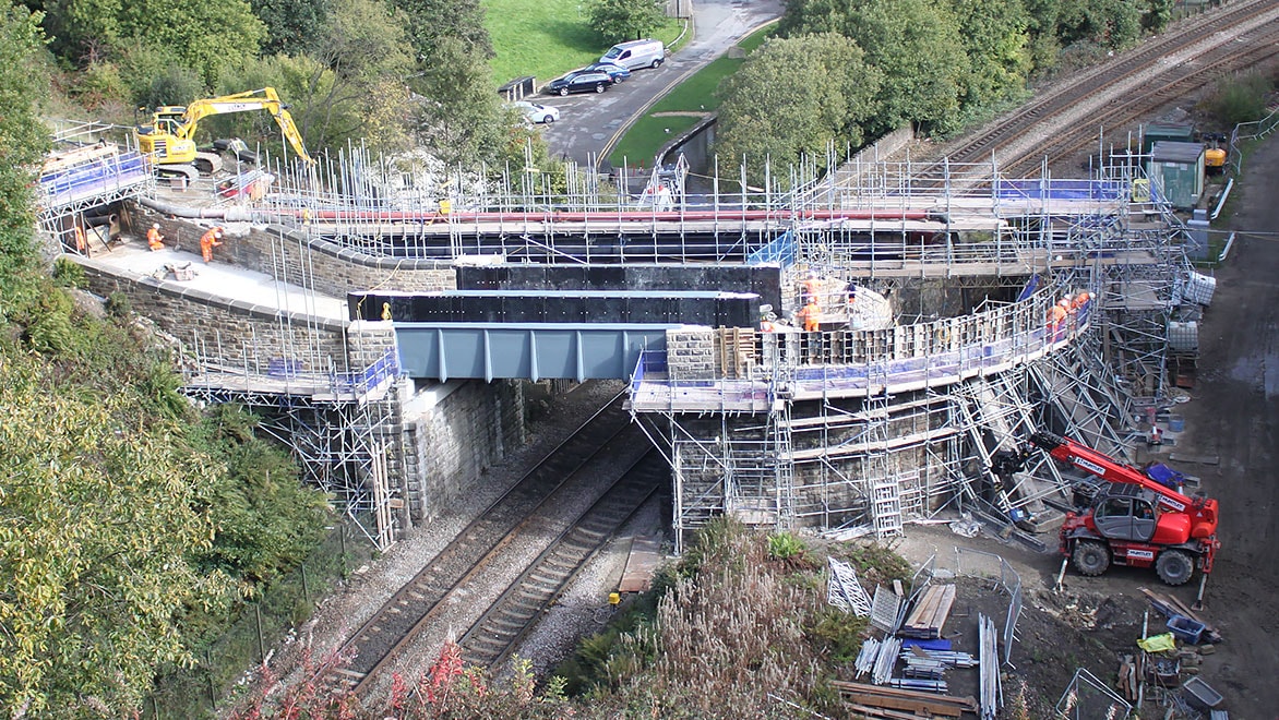 Image shows the installation of a large fibre-glass section of an aqueduct in Standedge, UK