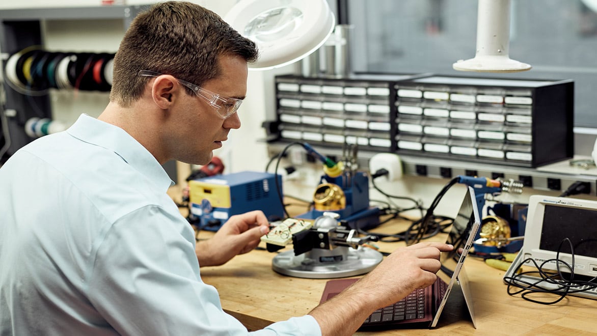 Man working in the electrical workshop.